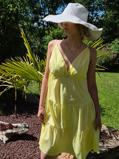 Robe courte avec broche soleil MS STATION